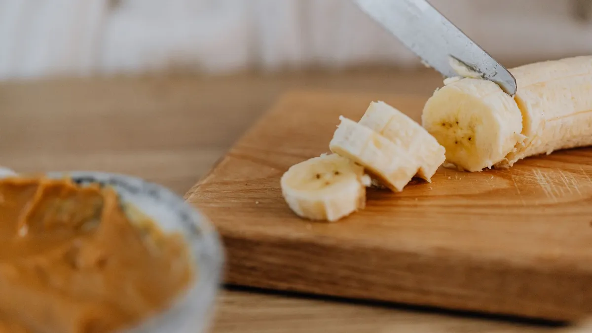 A sliced banana with peanut butter as a quick pre-workout snack